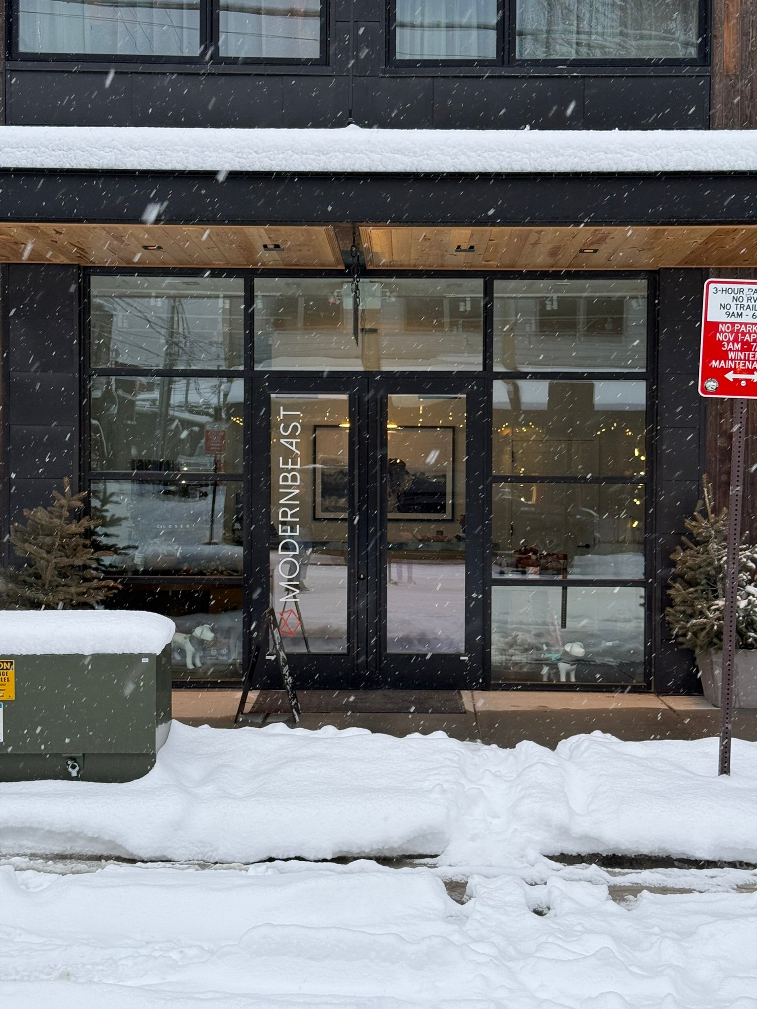 Modern building entrance with snow on the ground